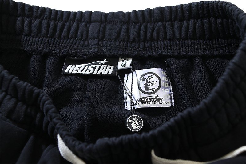 Hellstar Washed Black Pink Graphic Flared Sweatpants — neck_label