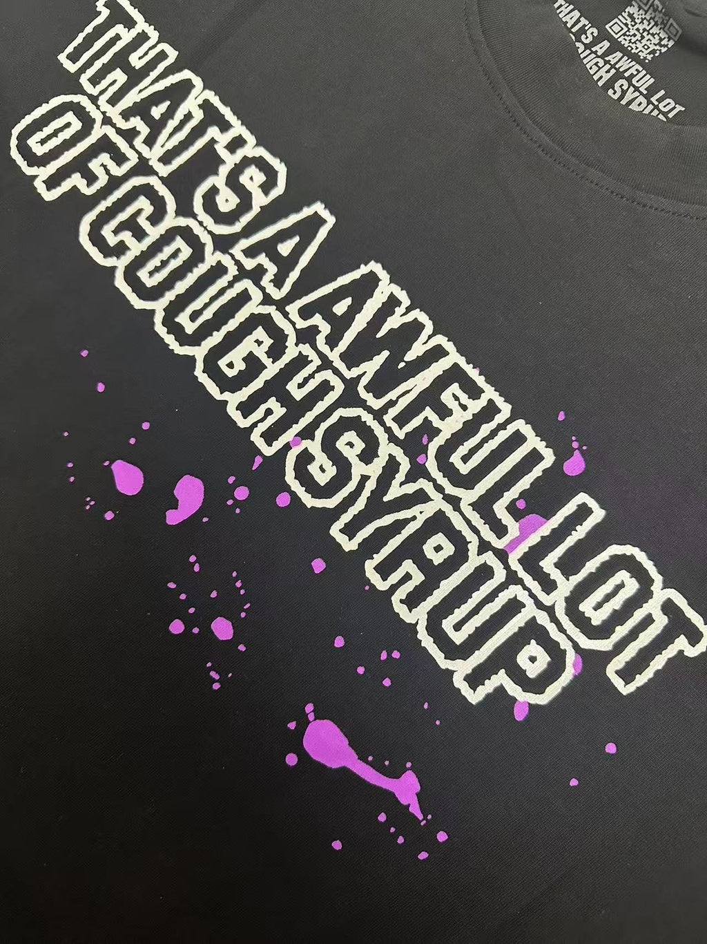 THAT'S A AWFUL LOT OF COUGH SYRUP Pink Splatter Heart Graphic T-Shirt — detail