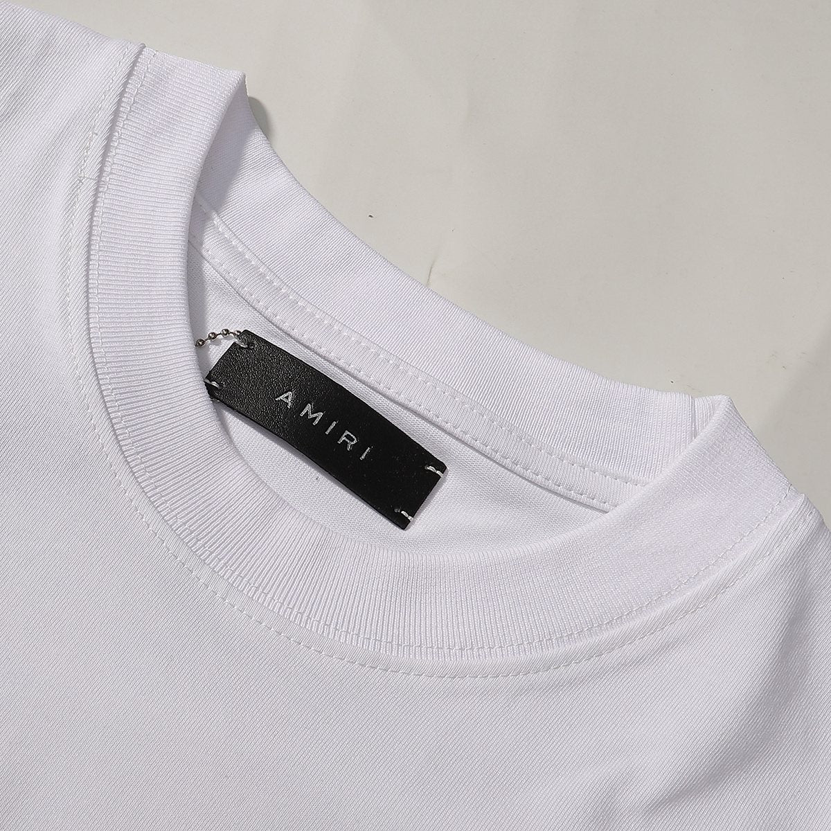 AMIRI Tropical Palm Tree Graphic T-Shirt — neck_label