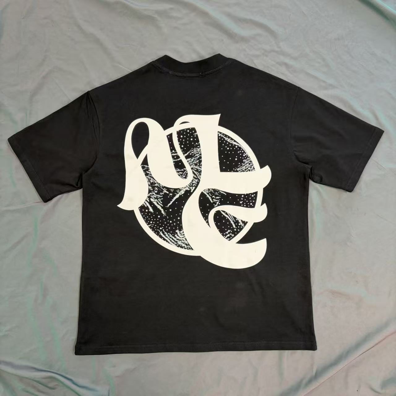 Black Abstract White Wordmark Graphic T-Shirt — front