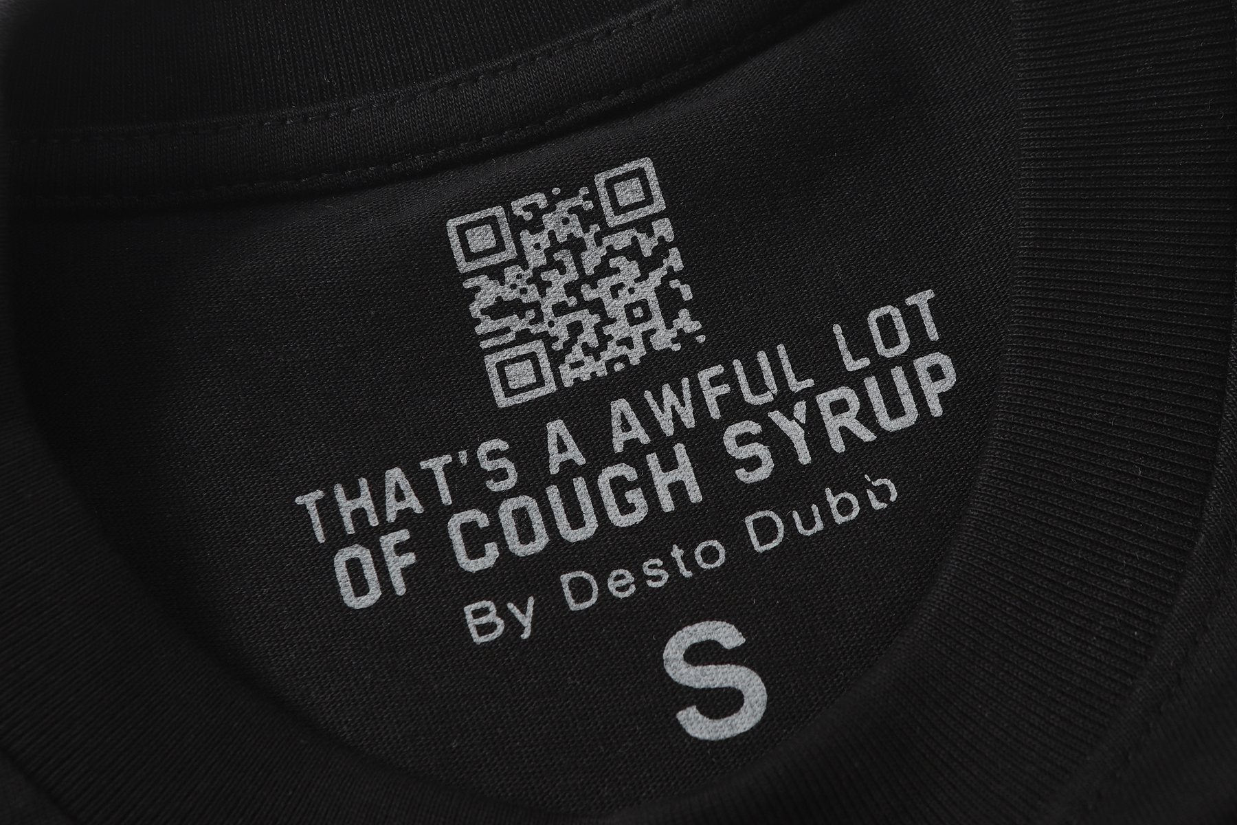 THAT'S A AWFUL LOT OF COUGH SYRUP Eiffel Tower Graphic T-Shirt — neck_label