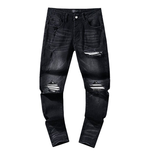 AMIRI Black Washed Distressed Jeans — hero