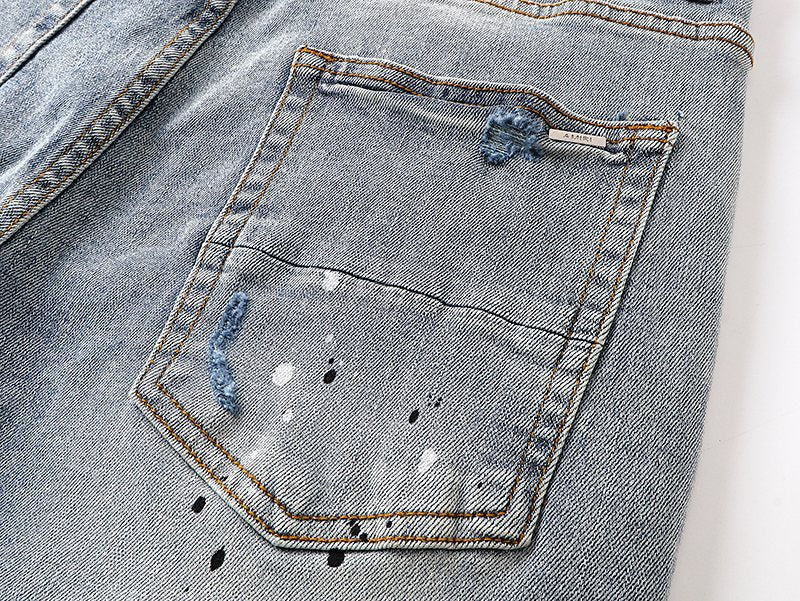 AMIRI Light Blue Distressed Paint Splatter Jeans — detail