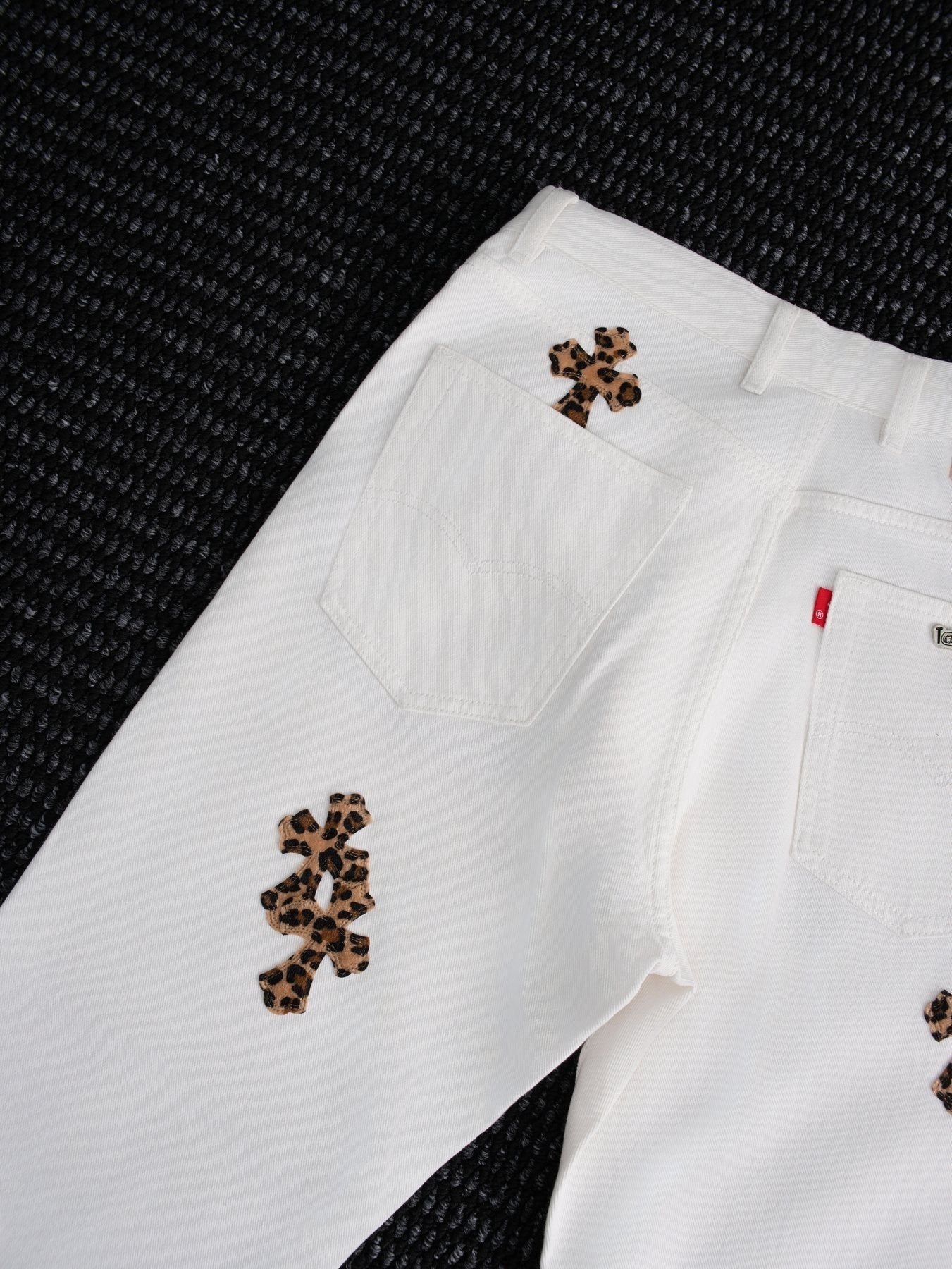 Chrome Hearts White Cross Applique Graphic Jeans — detail