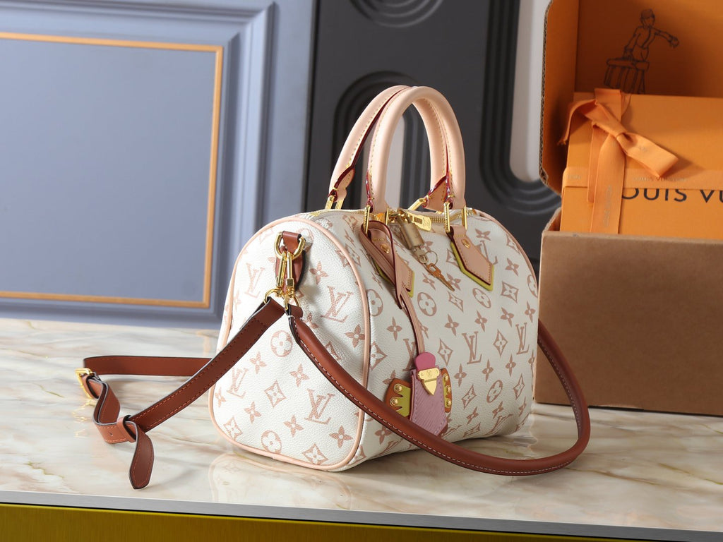 Louis Vuitton Crafty Speedy Bandoulière Handbag — side