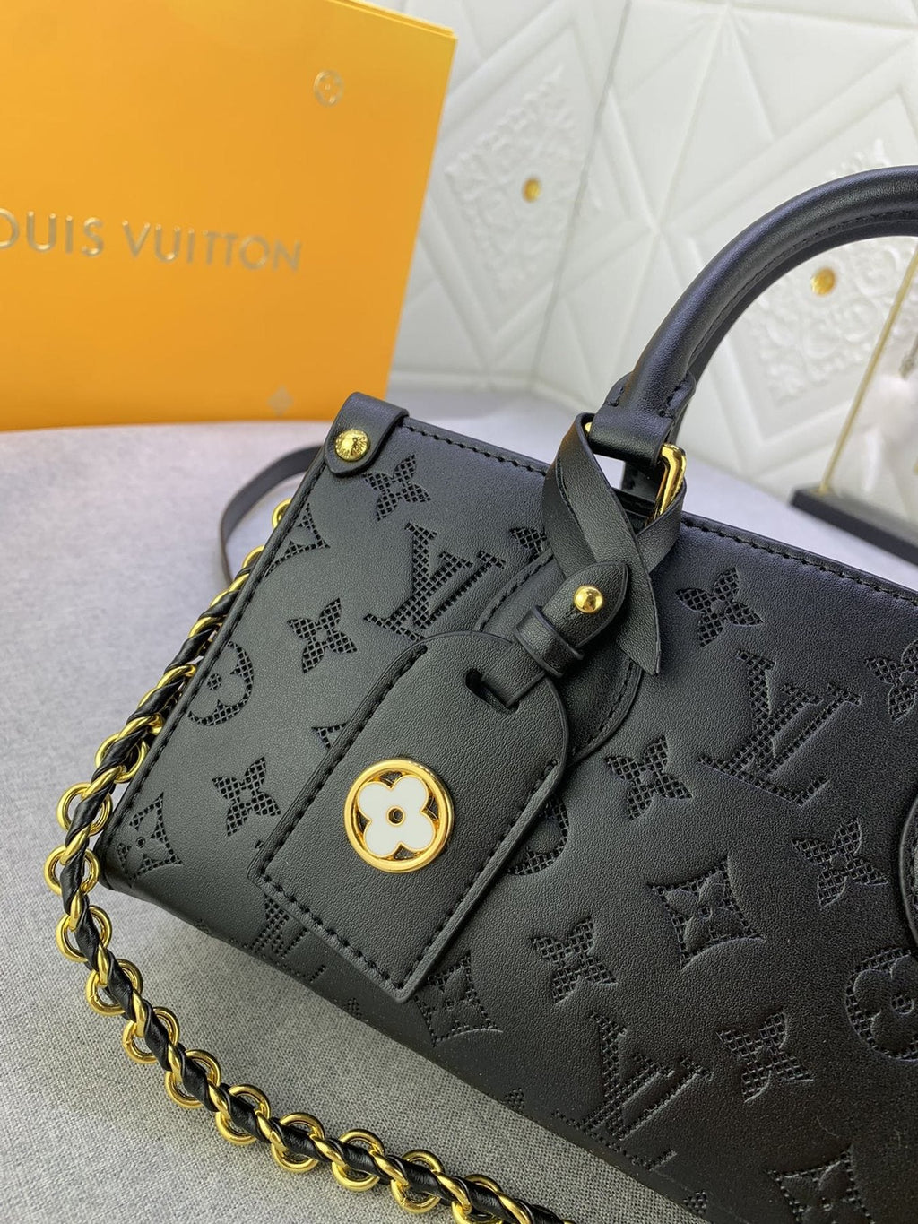 Louis Vuitton OnTheGo East West Embossed Leather Handbag — detail