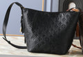 Louis Vuitton Tapered Monogram Shoulder Bag — hero