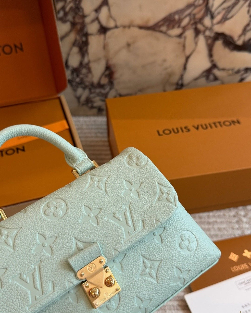 Louis Vuitton Nano Madeleine Monogram Empreinte Top-Handle Bag — detail