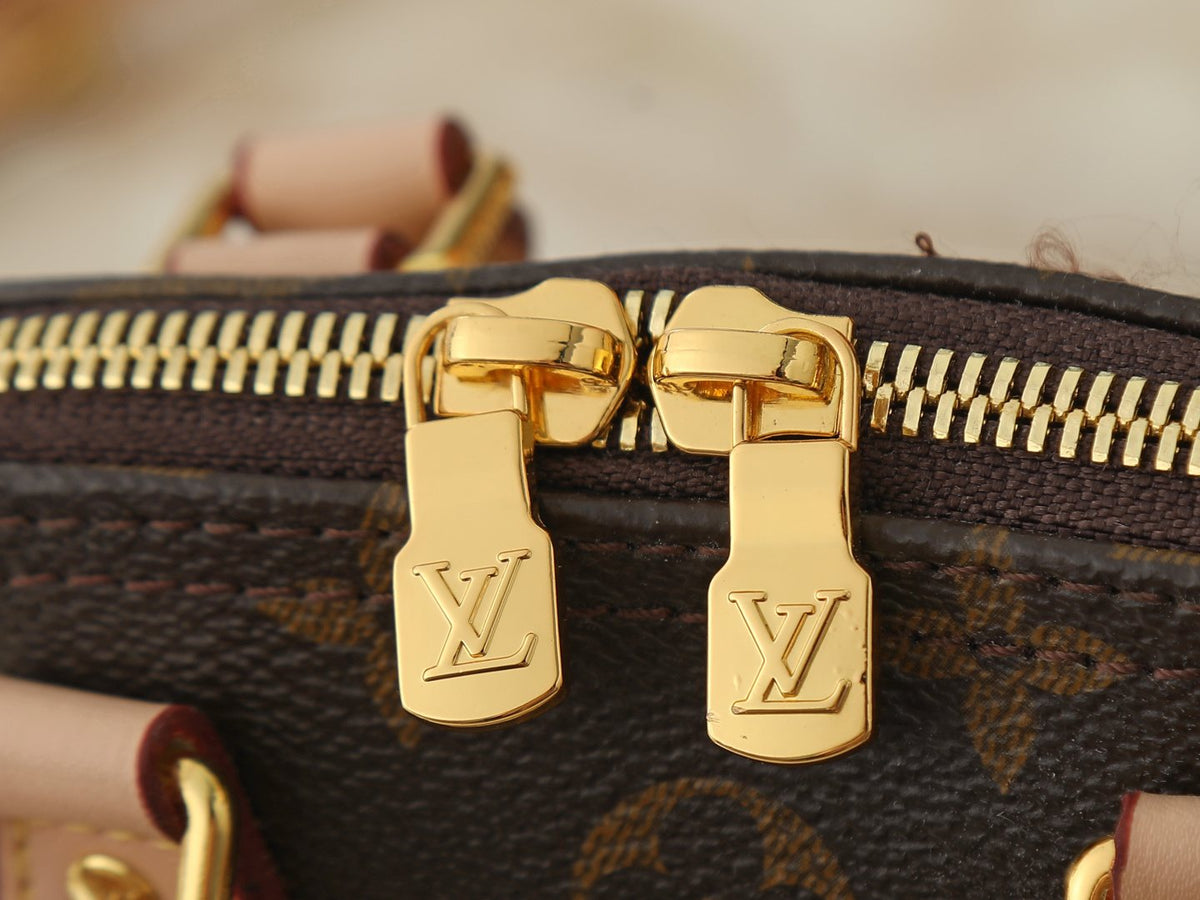 Louis Vuitton Nano Alma Monogram Top-Handle Bag — detail