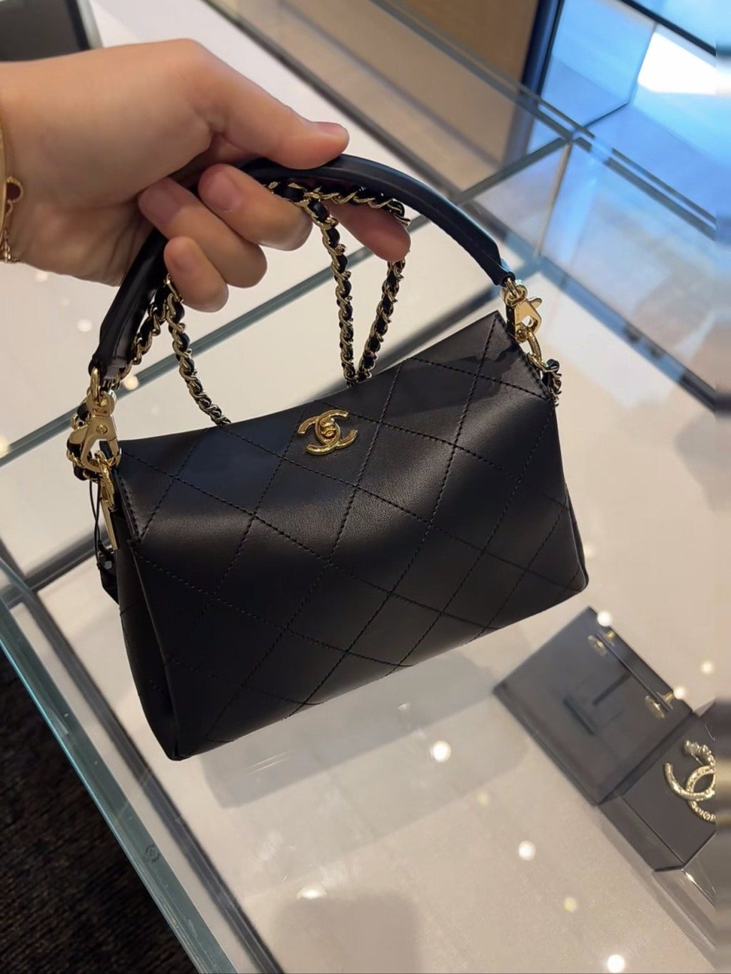 Chanel Black Diamond-Quilted Top Handle Bag — hero