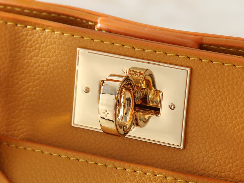 Louis Vuitton On My Side Turn-Lock Tote — detail