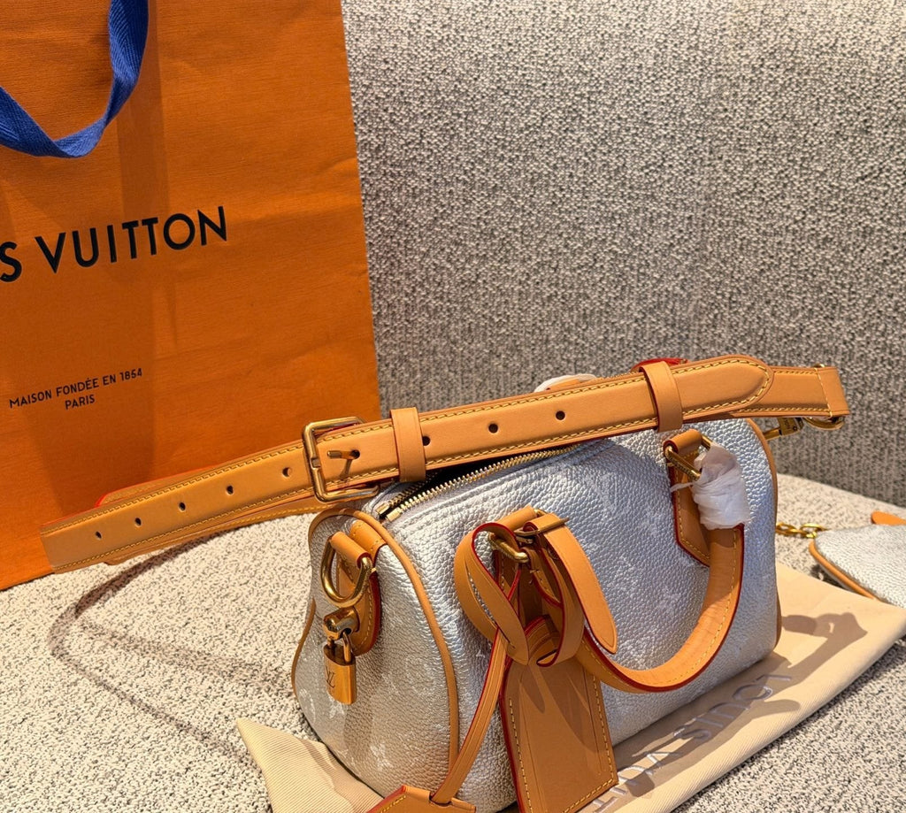 Louis Vuitton Speedy Rolled-Handle Satchel — side