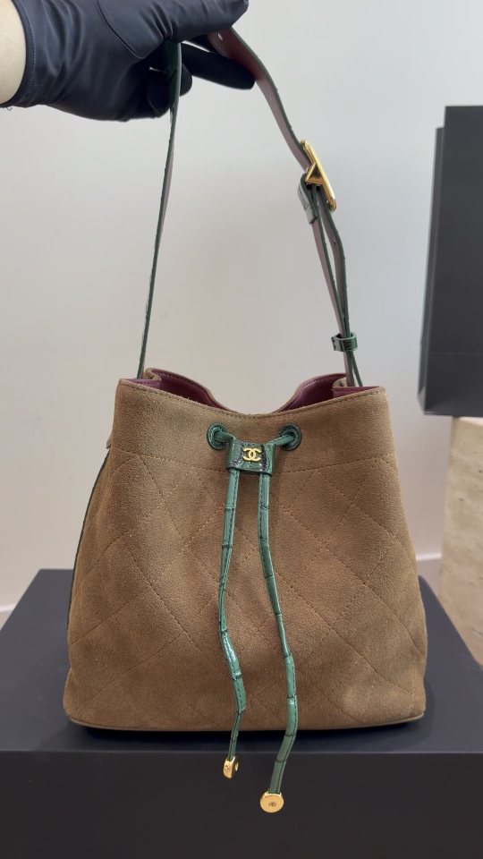Chanel Contrast-Trim Drawstring Bucket Bag — hero