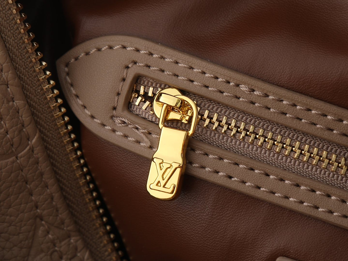 Louis Vuitton Speedy Bandoulière Embossed Monogram Bag — detail