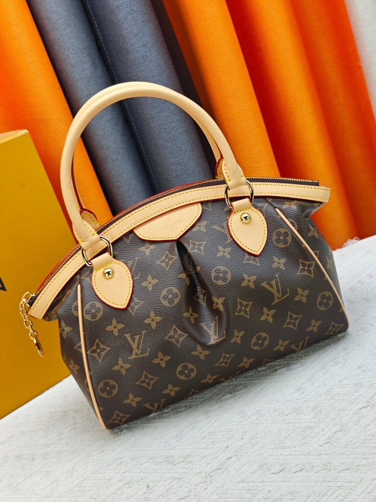 Louis Vuitton Tivoli Monogram Bowling Handbag — hero
