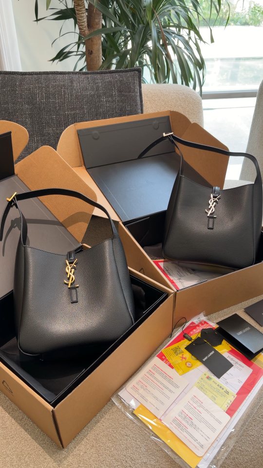Saint Laurent Black Curved Hobo Shoulder Bag — comparison