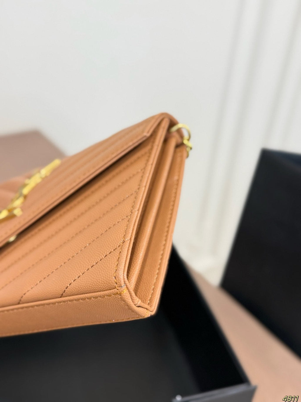 Saint Laurent Chevron-Quilted Envelope Chain Bag — detail