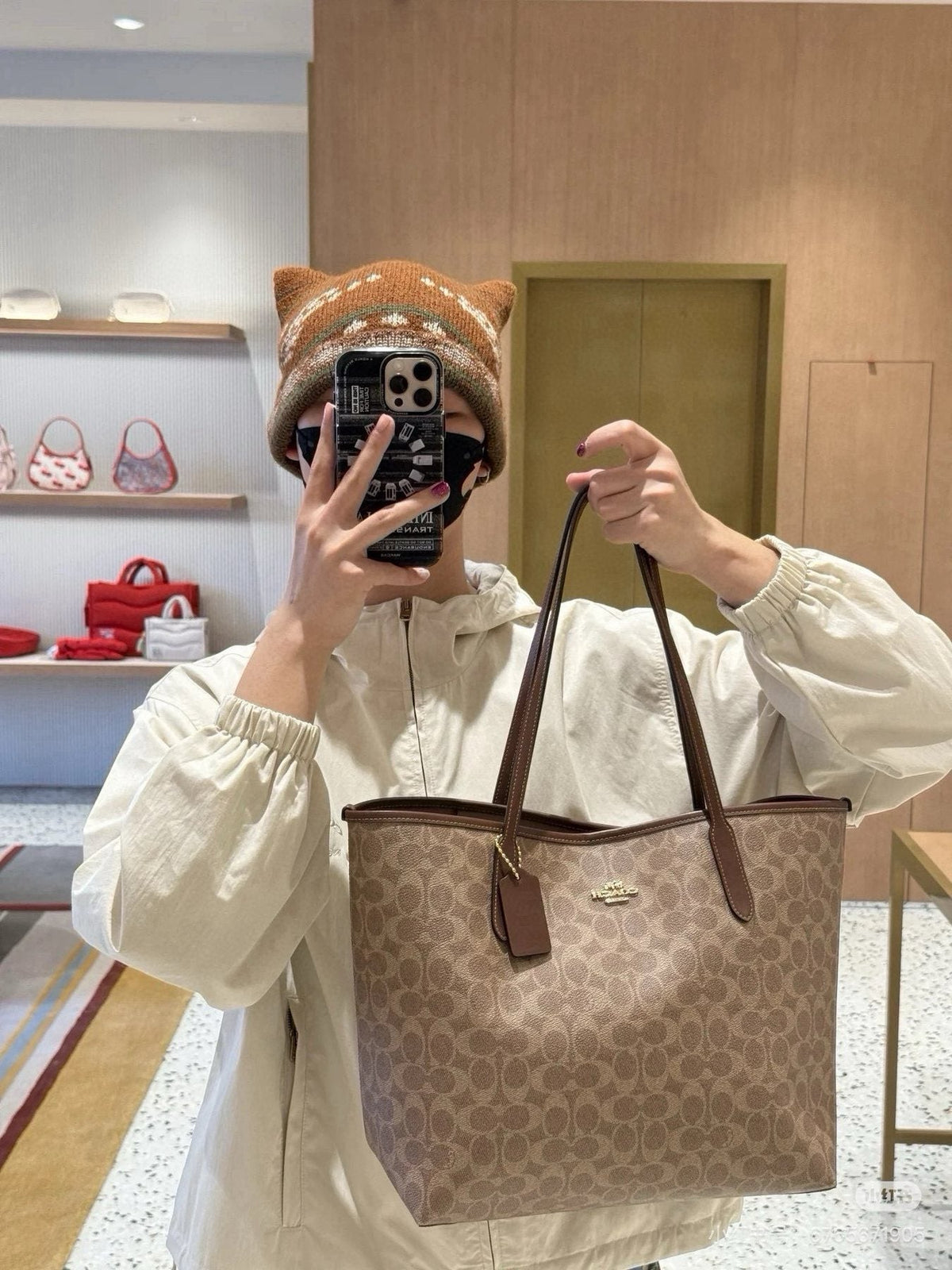 Coach Patterned Tapered Tote Bag — model