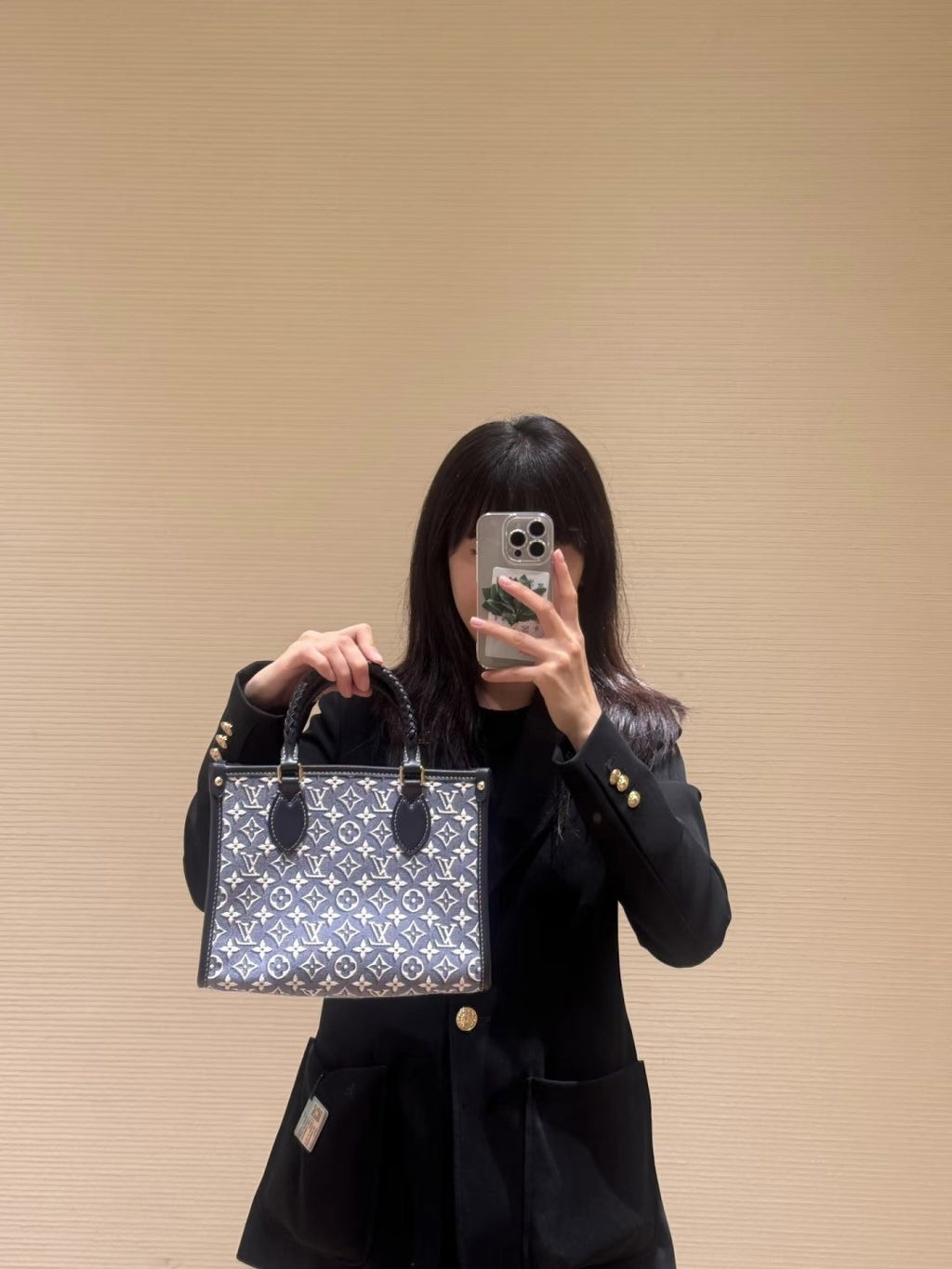 Louis Vuitton OnTheGo Denim Monogram Tote — model