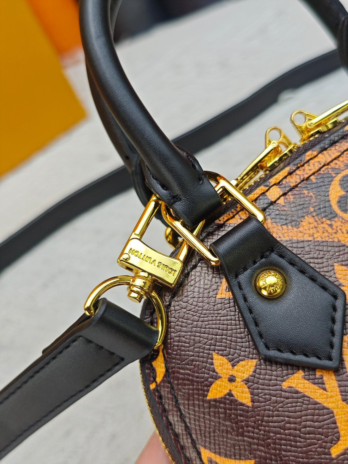 Louis Vuitton Alma BB Domed Top-Handle Bag — detail