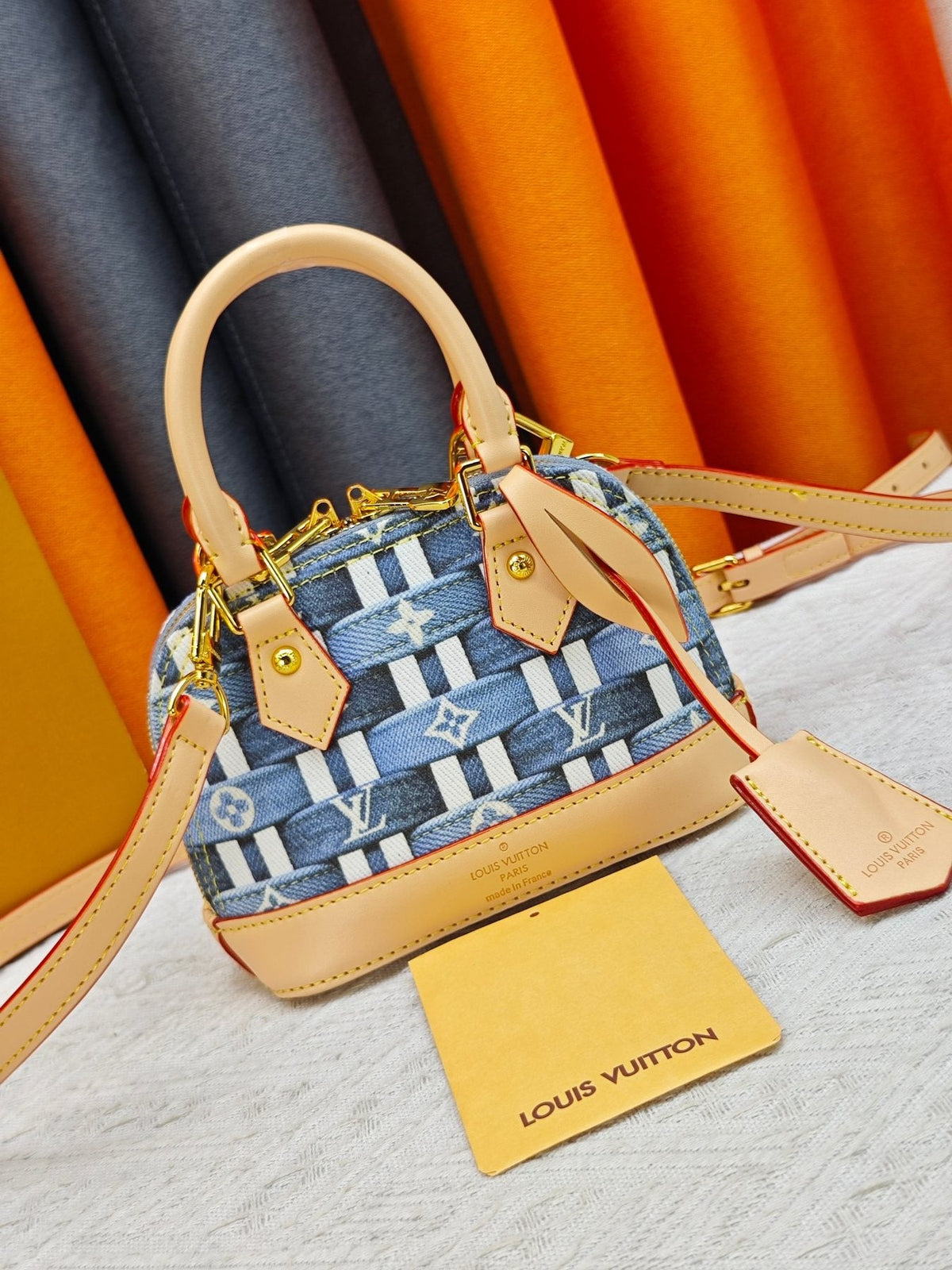 Louis Vuitton Alma BB Domed Top-Handle Bag — front