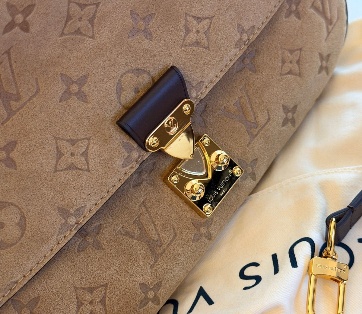 Louis Vuitton Liv Pochette Embossed Monogram Shoulder Bag — detail