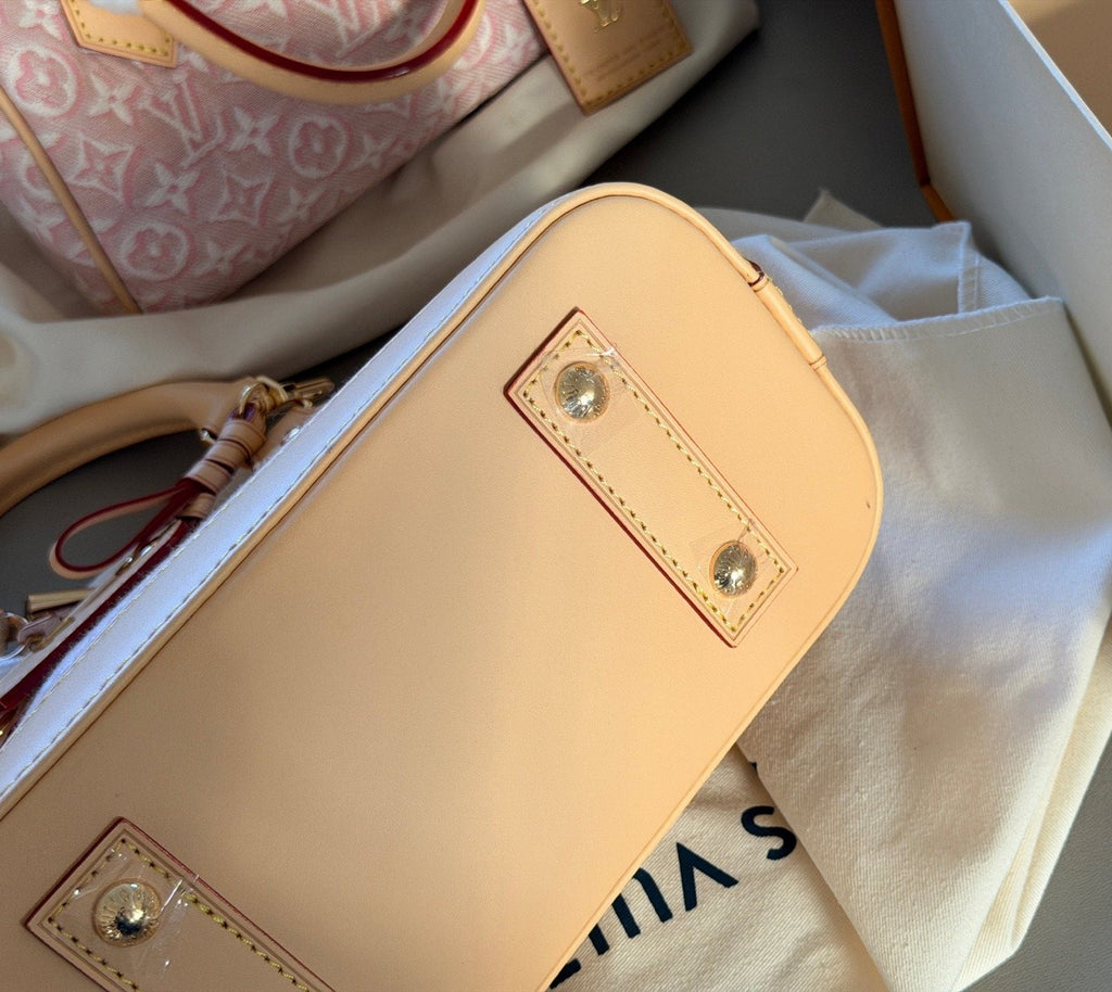 Louis Vuitton Alma BB Monogram Top-Handle Bag — detail