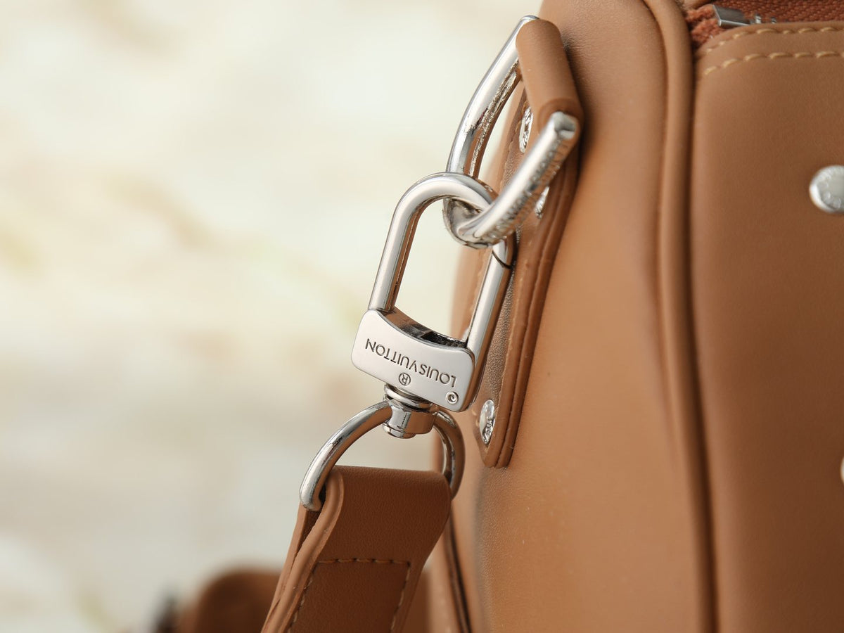 Louis Vuitton Keepall Studded Tan Duffel Bag — detail