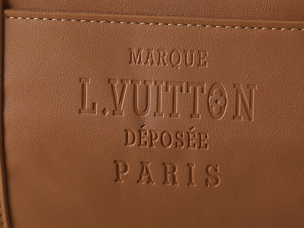 Louis Vuitton Keepall Studded Tan Duffel Bag — detail