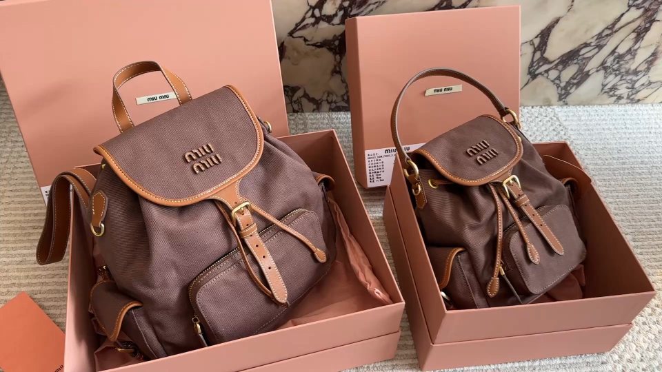 Miu Miu Canvas Flap Backpack — comparison