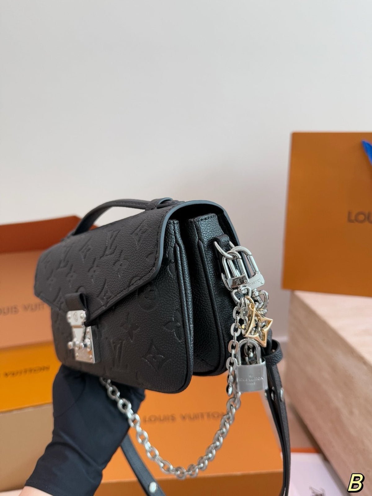 Louis Vuitton Pochette Métis East West Embossed Shoulder Bag — side