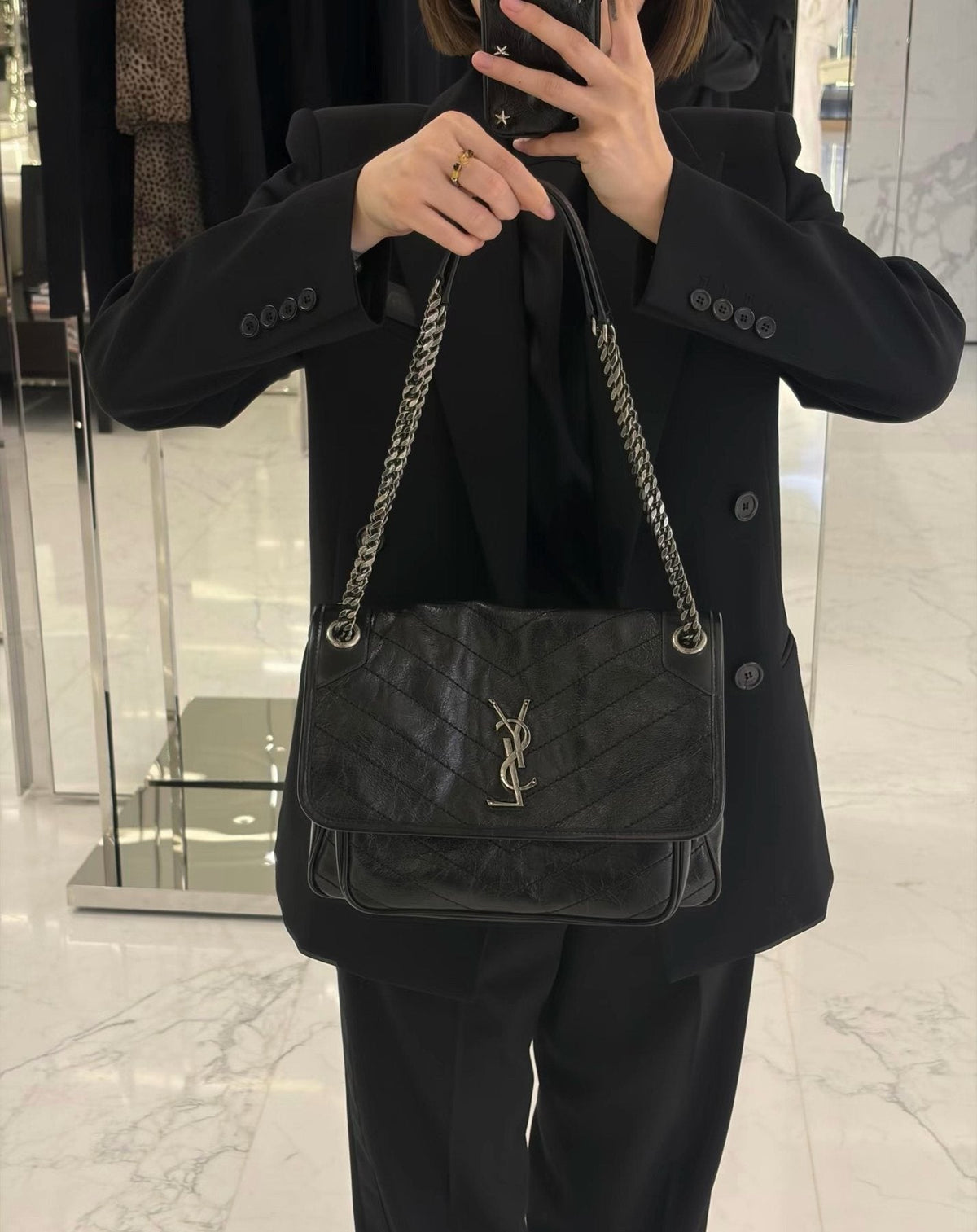 Saint Laurent Niki Chevron-Quilted Shoulder Bag — model