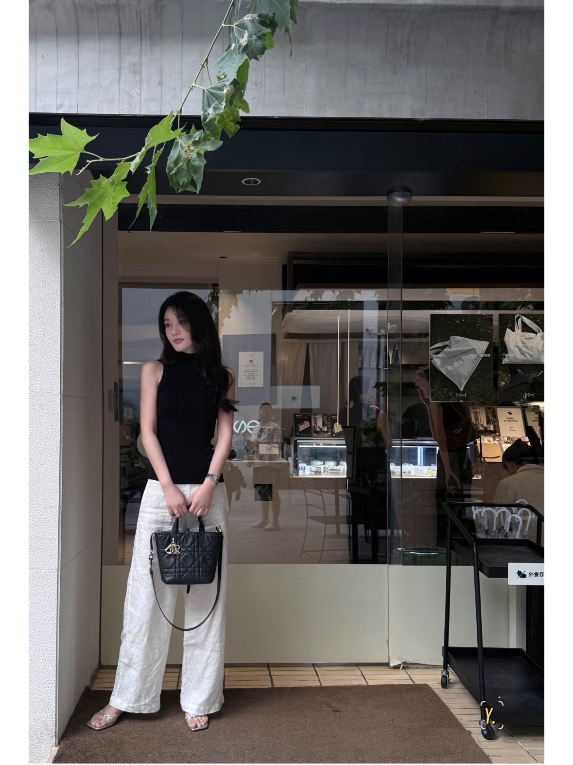 Dior Toujours Quilted Top-Handle Handbag — model