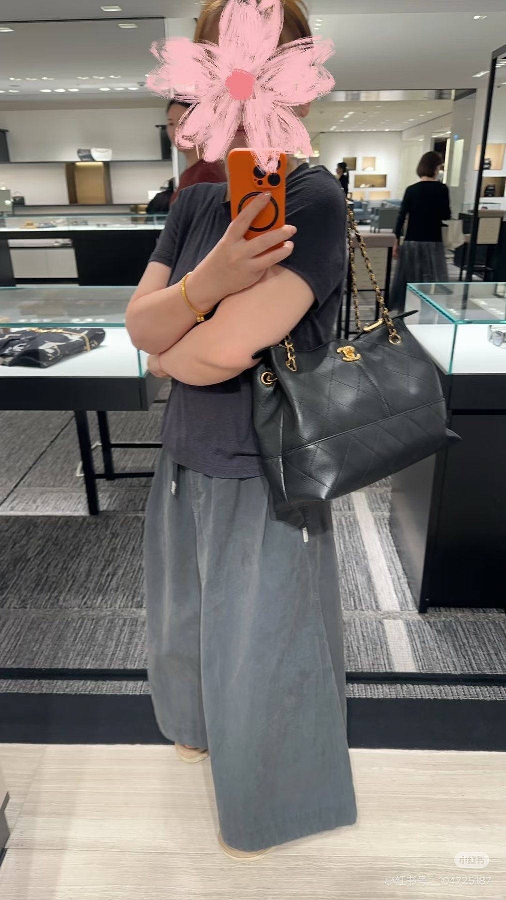 Chanel Quilted Hobo Bag with Draped Chain — model
