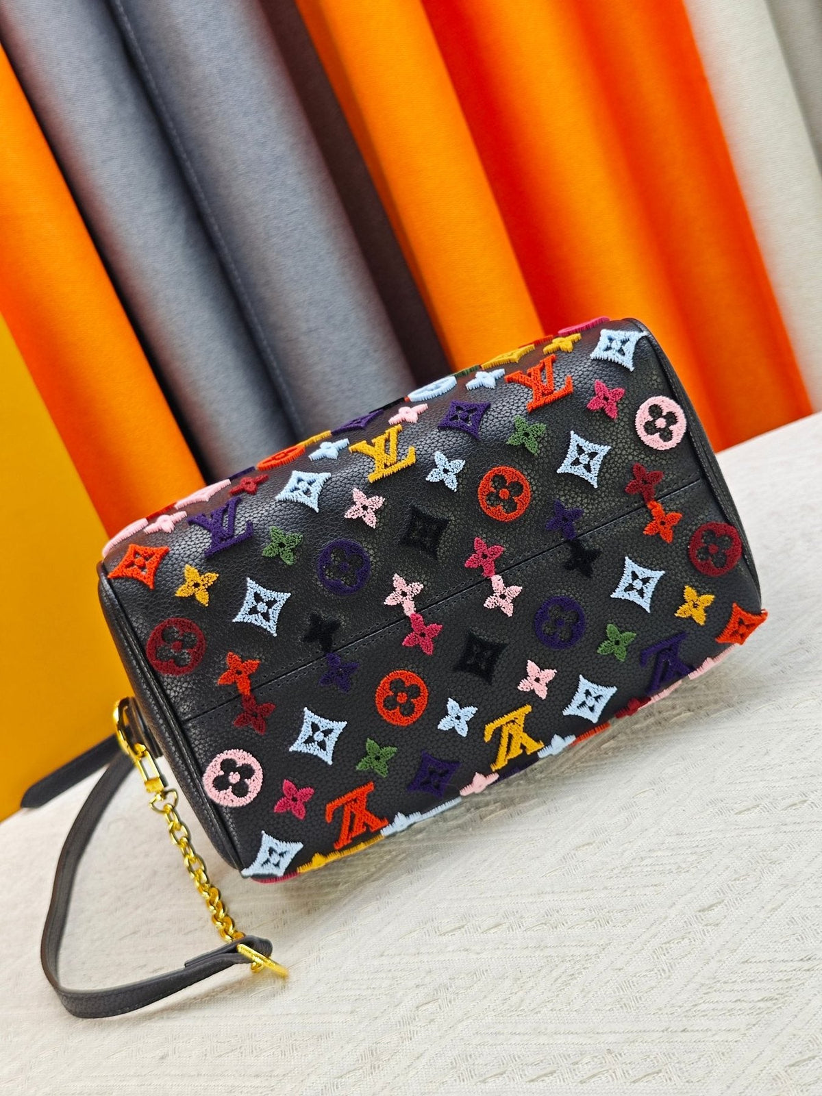 Louis Vuitton Speedy Bandoulière Printed Leather Bag — detail