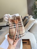 Beige Check Drawstring Bucket Bag with Tan Trim — hero