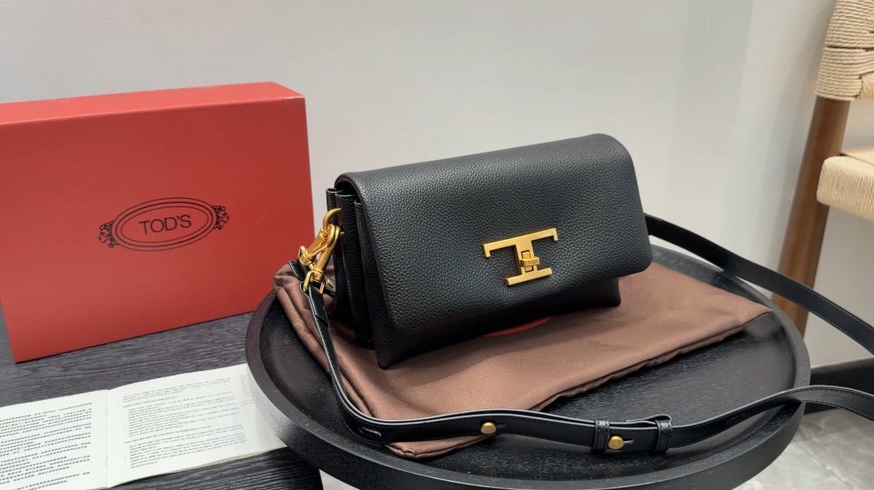 Tod's Black Accordion Flap Shoulder Bag — hero