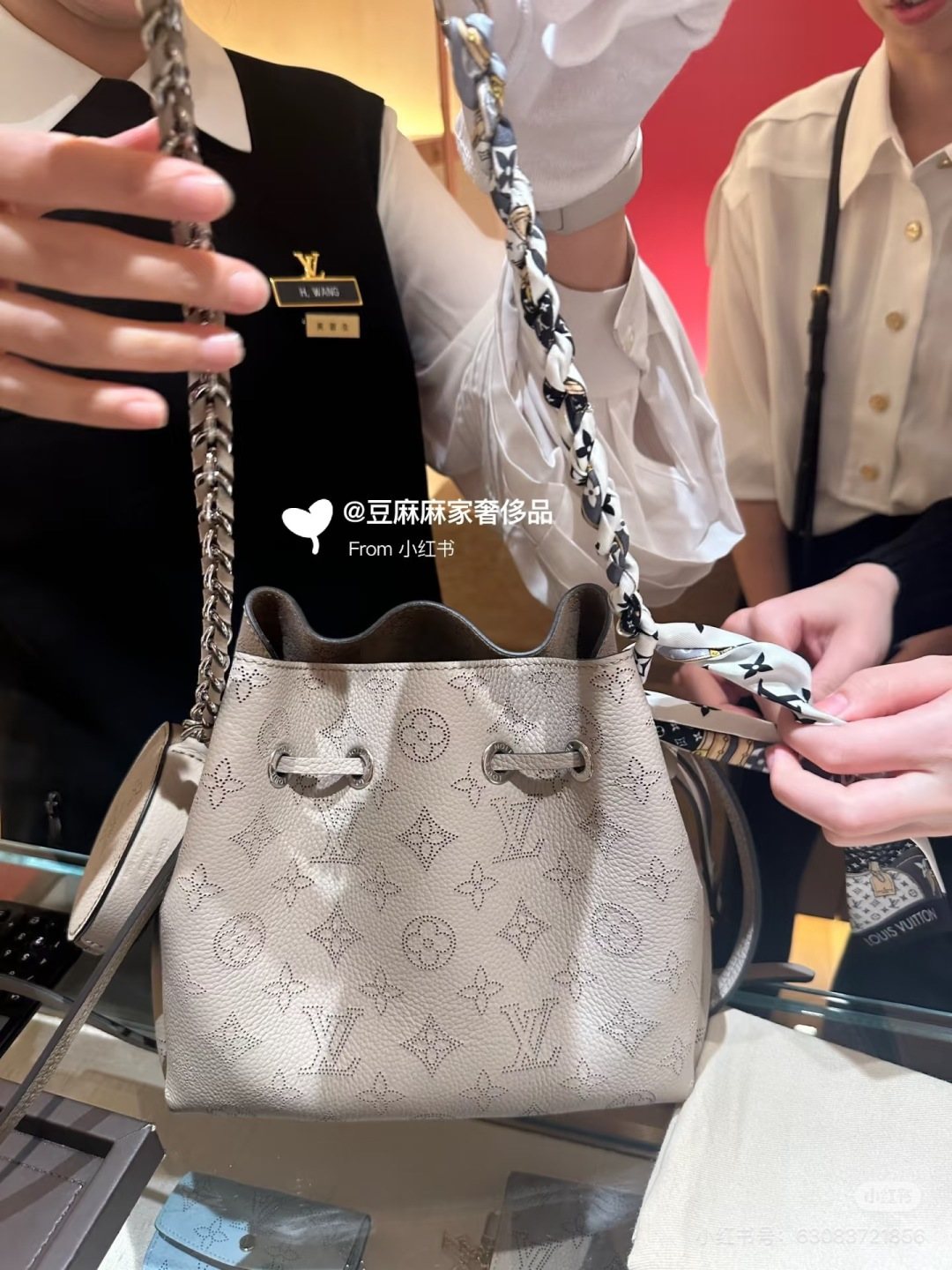 Louis Vuitton Bella Monogram Bucket Bag — front
