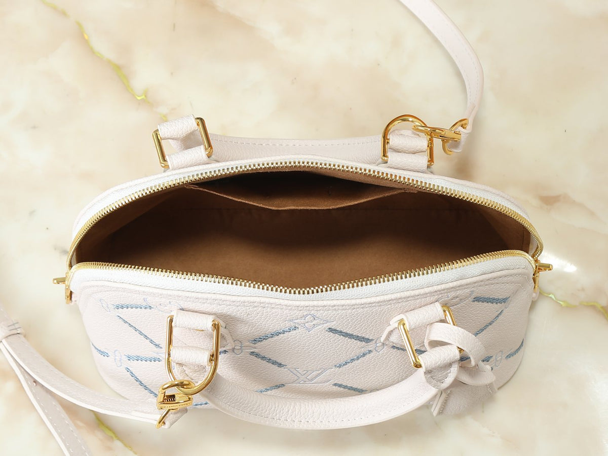 Louis Vuitton Alma BB Monogram Empreinte Couture Handbag — detail