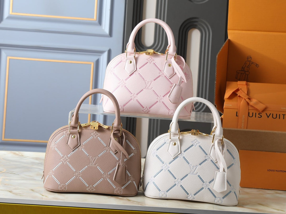 Louis Vuitton Alma BB Monogram Empreinte Couture Handbag — comparison