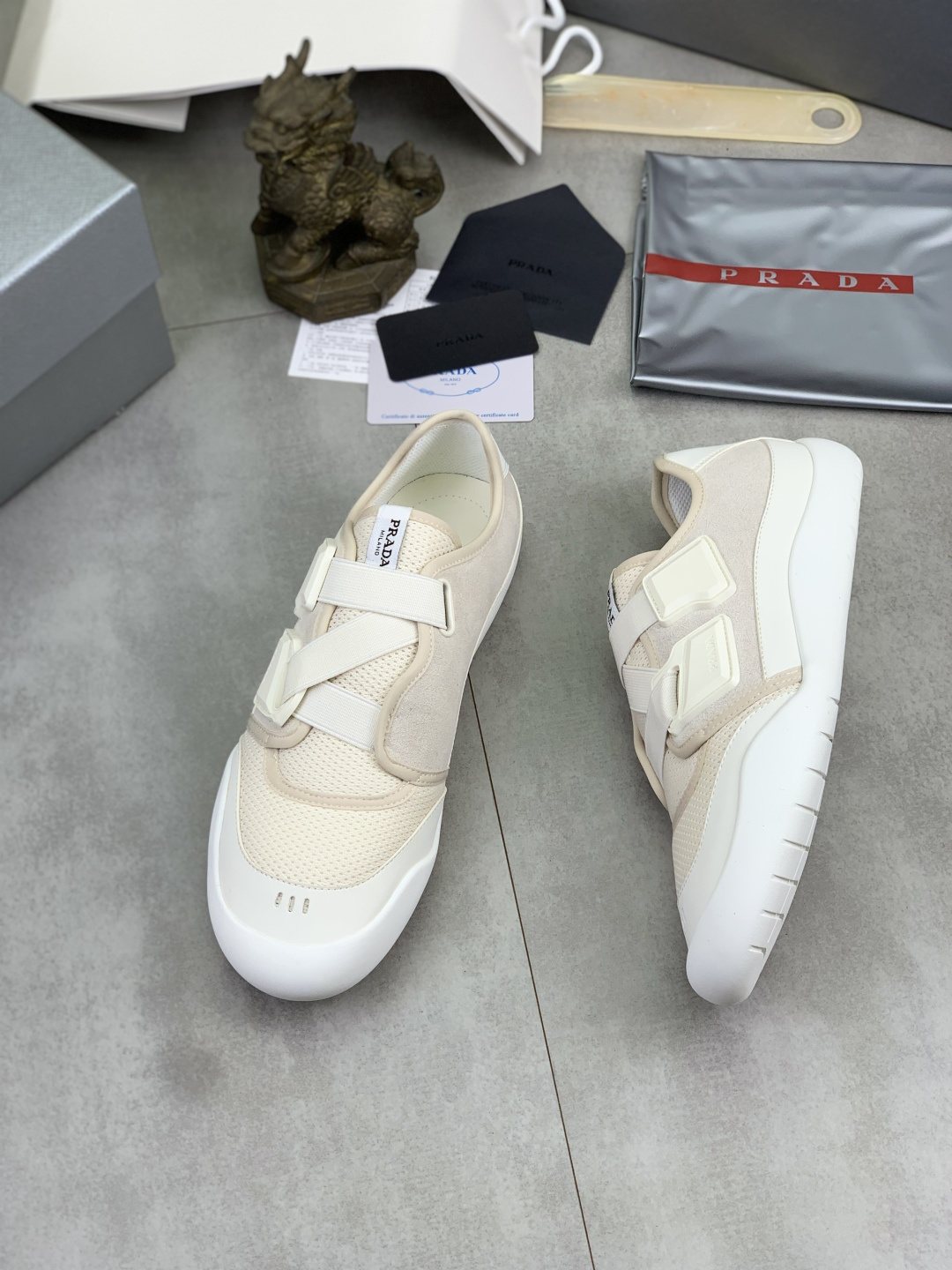 Prada Cross-Strap Low-Top Sneakers — front