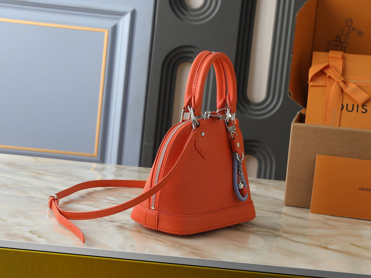 Louis Vuitton Epi Rainbow Alma BB Bag — side