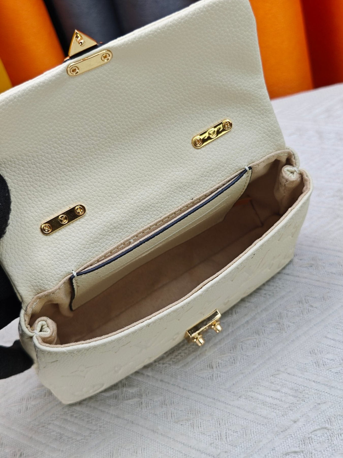 Louis Vuitton Nano Madeleine Monogram Empreinte Handbag — front