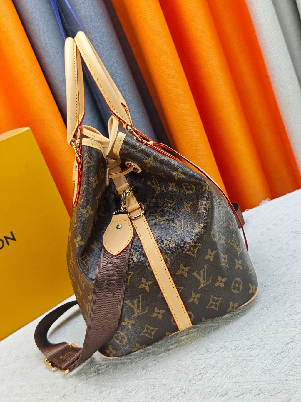 Louis Vuitton NEO Monogram Drawstring Bucket Bag — side