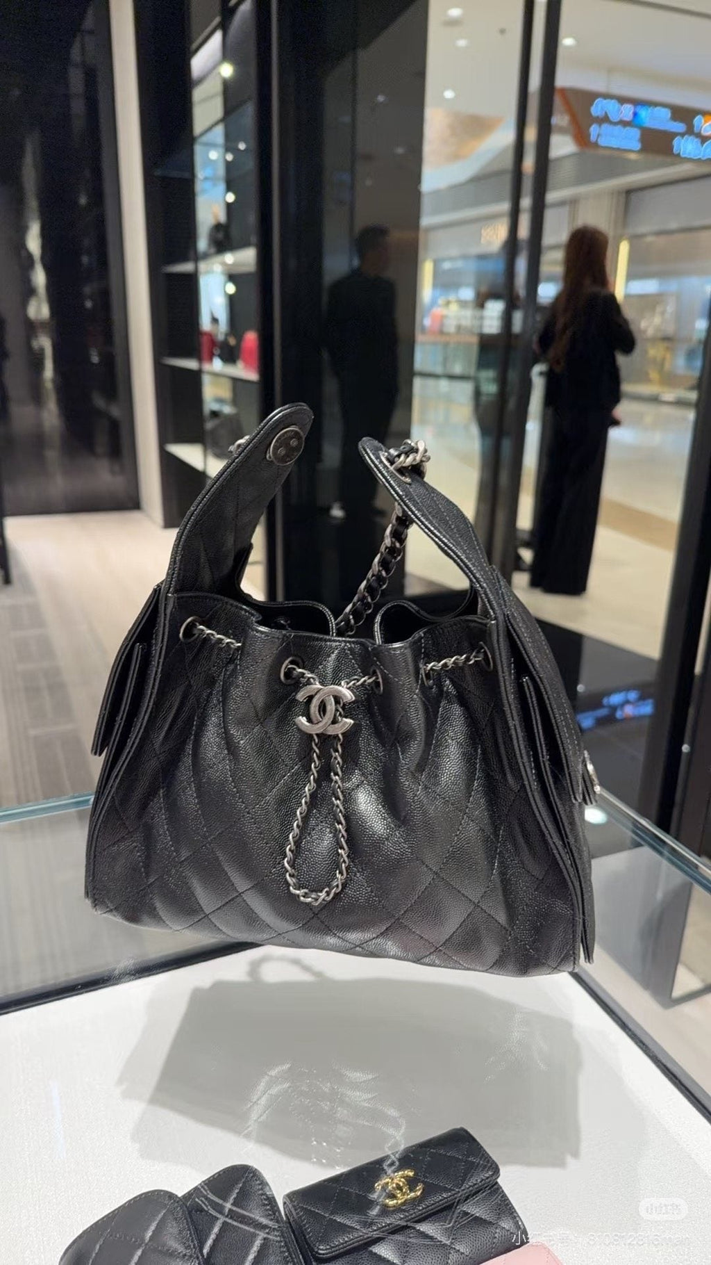 Chanel 25 Quilted Drawstring Bucket Bag — hero