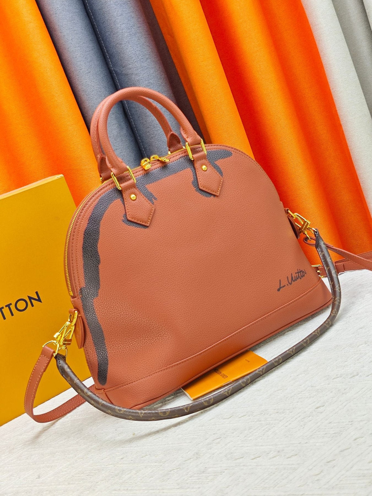 Louis Vuitton Alma Soft Cognac Top-Handle Bag — front