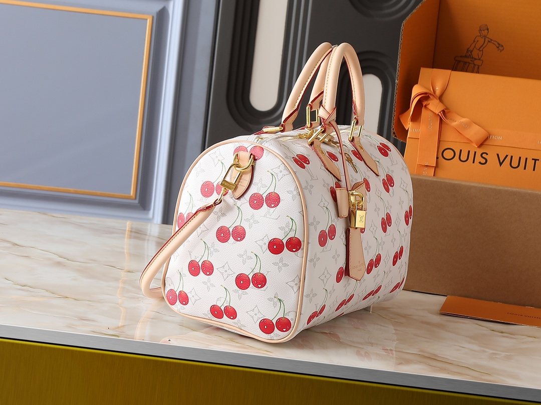 Louis Vuitton Speedy Soft Monogram Top-Handle Bag — side