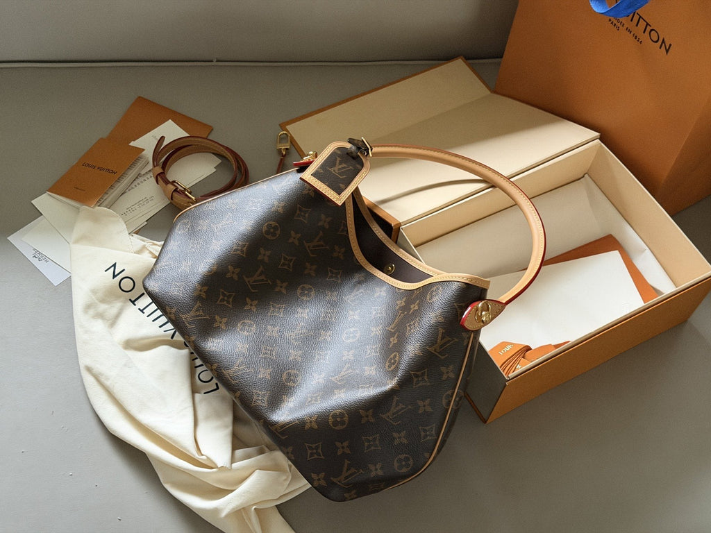 Louis Vuitton Carryall Monogram Shoulder Bag — hero