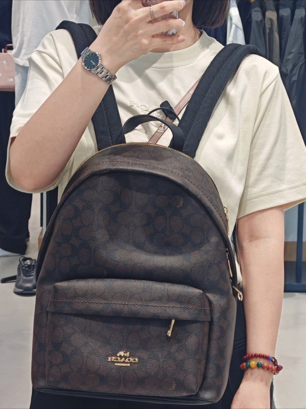 Coach Taylor Monogram Zip-Pocket Backpack — model