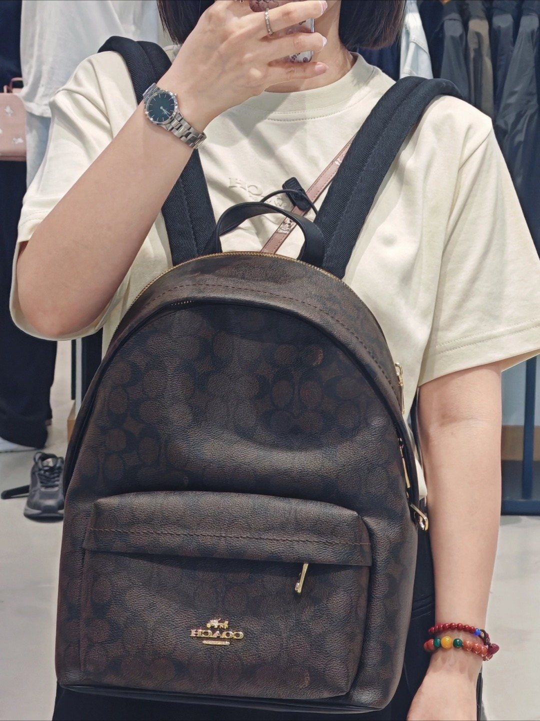 Coach Taylor Monogram Zip-Pocket Backpack — model